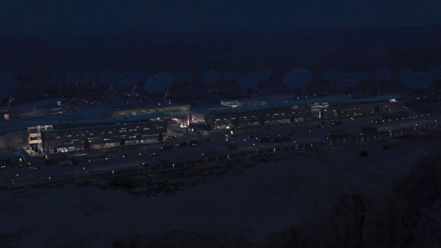 Nighttime aerial view of the Joint Dark Energy Mission.