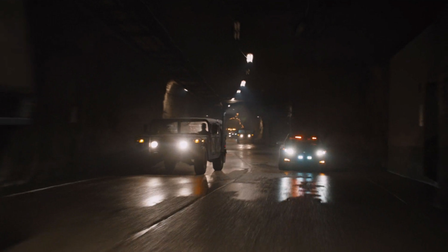 Cars driving through a tunnel at the Joint Dark Energy Mission.