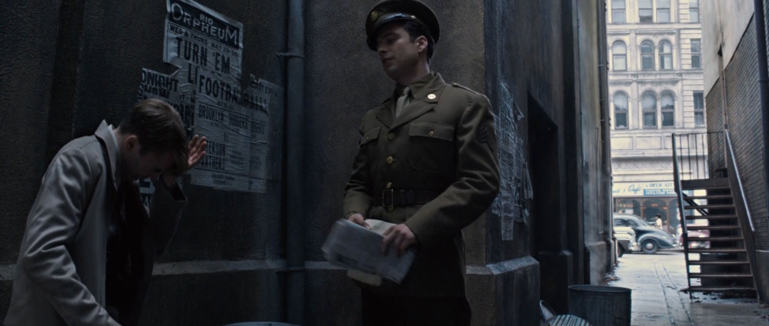 Steve Rogers and Bucky barnes in an alley.