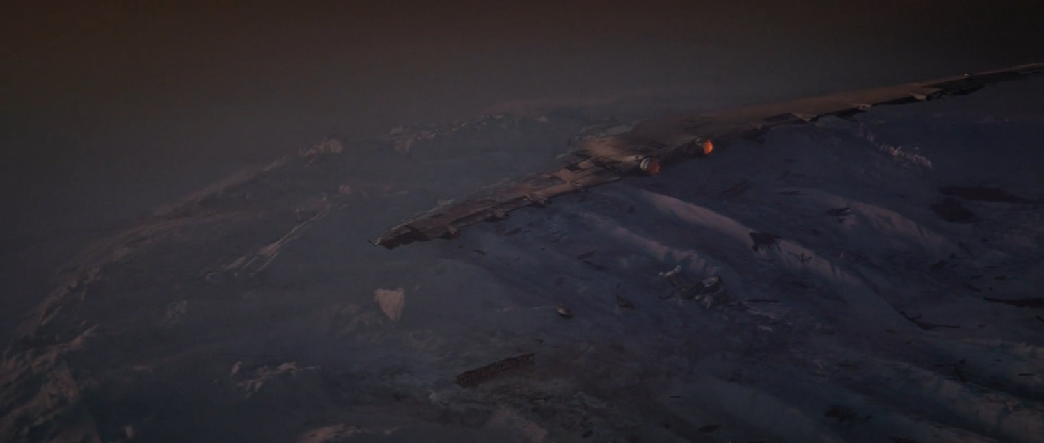 Airplane wreckage in the snow.