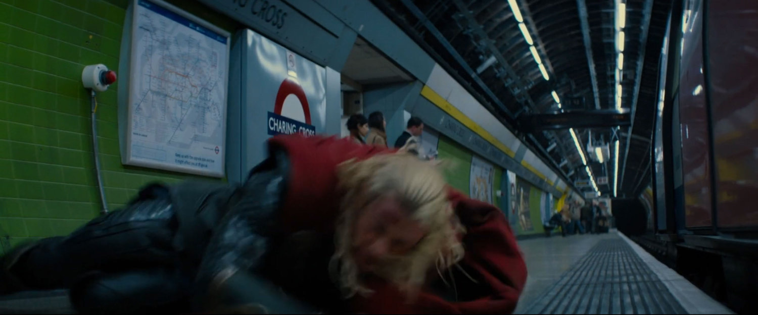 Thor laying on the platform for the Charing Cross tube station.