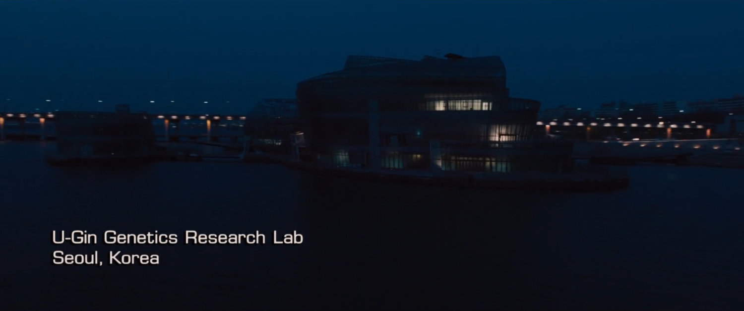 Nighttime shot of U-Gin Genetics. Text: U-Gin Genetics Reserach Lab, Seoul Korea.