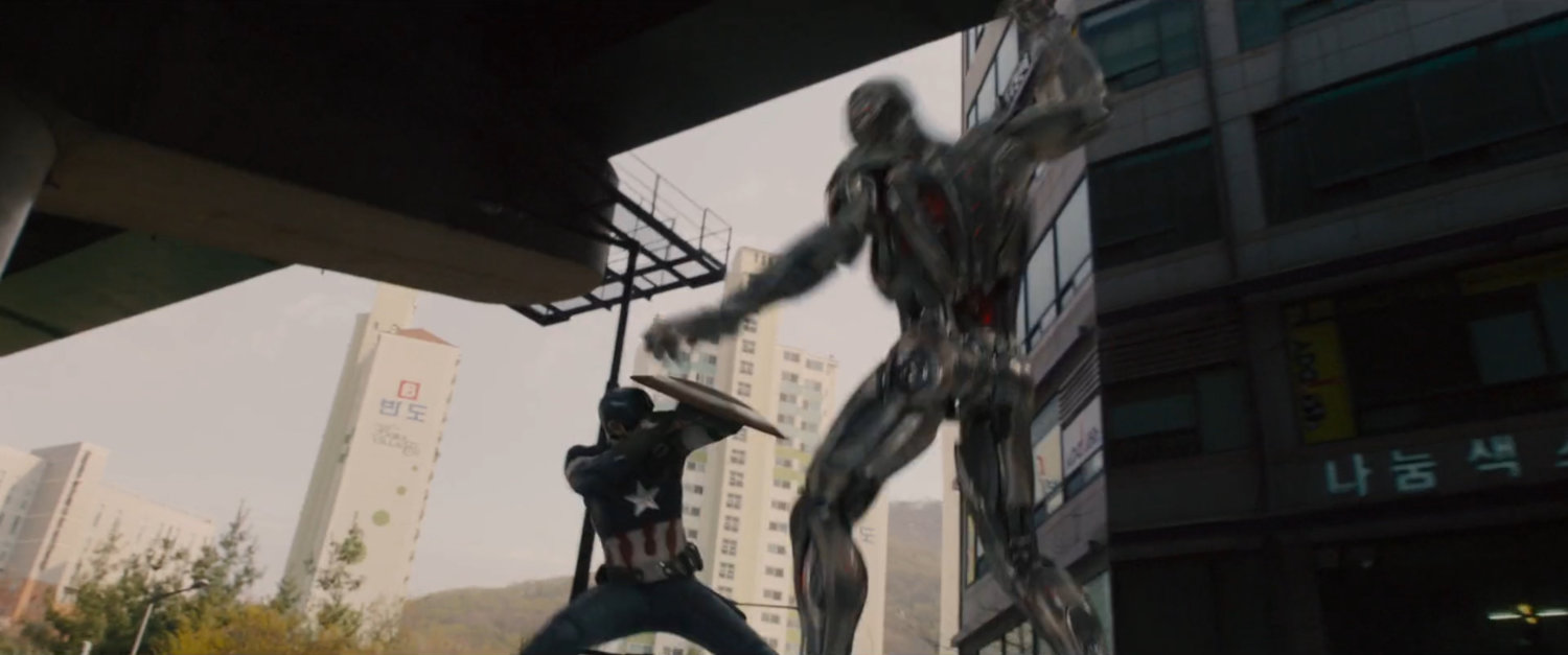 Captain America fights Ultron on a moving truck in a Seoul street.