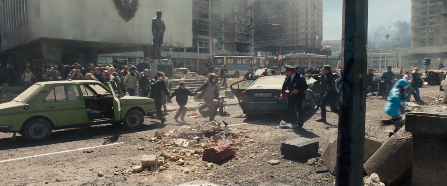 Citizens flee the debris strewn city  of Novi Grad.