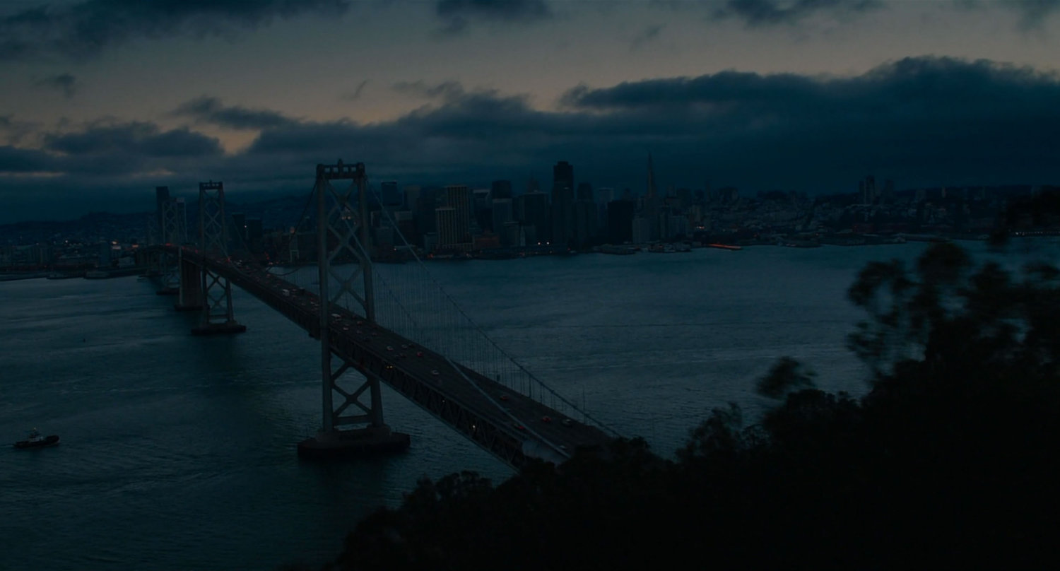 Aerial view of Bay Bridge at dusk.