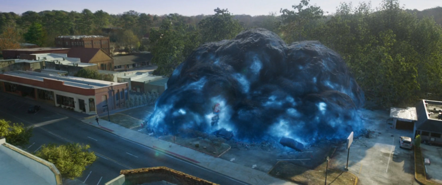 An alien spore consumes a Dairy Queen.