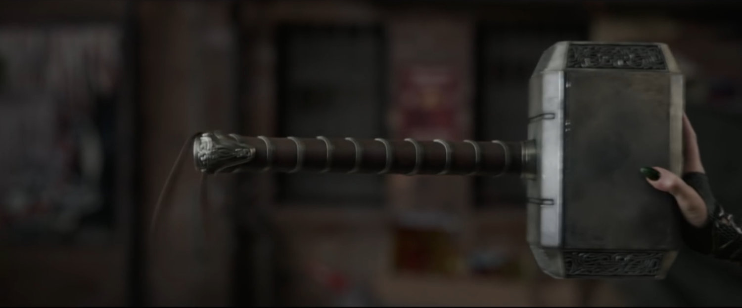 Mjolnir stopped by a hand.