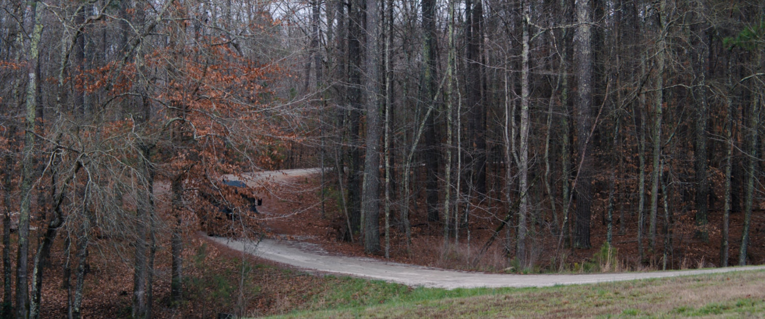 SWORD SUV on a gravel road.