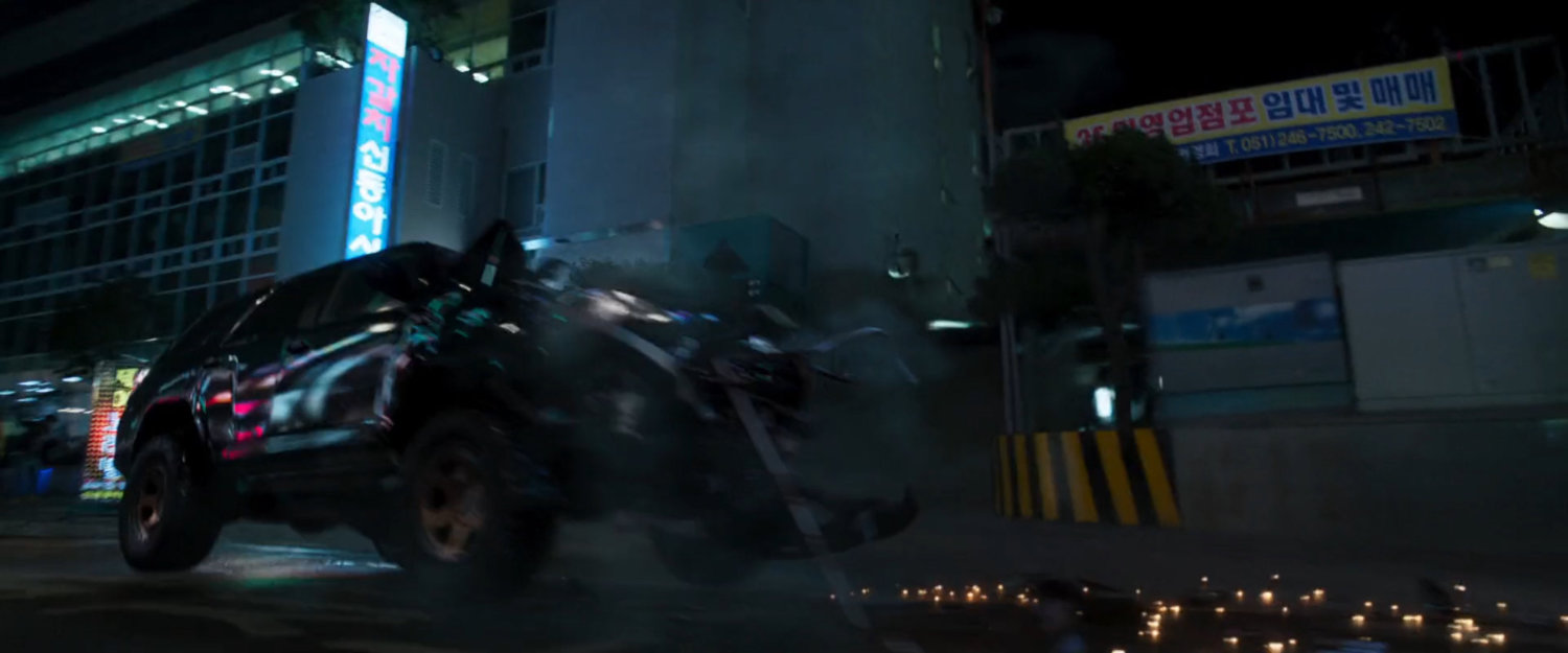 Crashed SUV outside Busan seafood market.