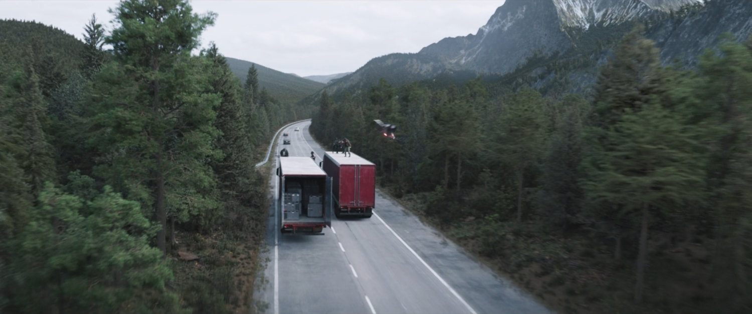 Two trucks drive on German interstate.