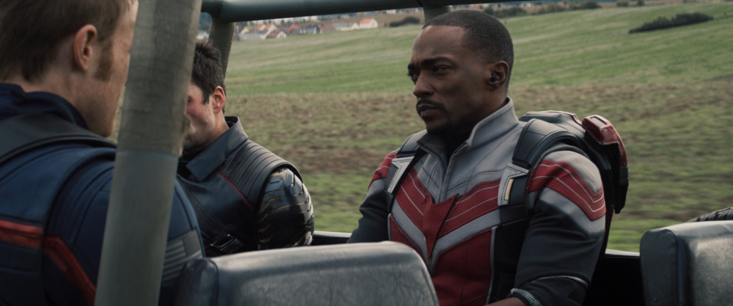 Sam and Bucky in the back of a truck.