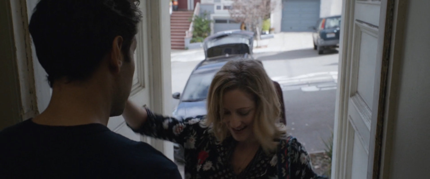 Scott and Maggie at the front door of Scott Lang's house.
