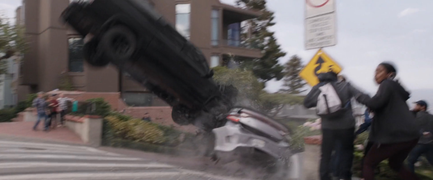 SUV crashing into parked car at top of Lombard Street.