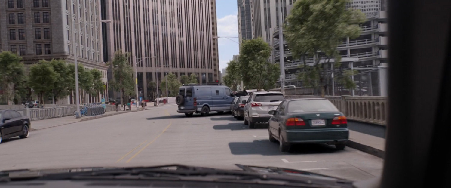 POV from SUV looking towards crashed van.