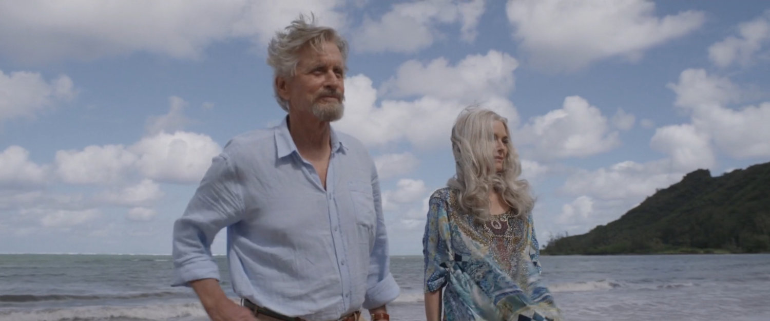 Hank and Janet on a tropical beach.