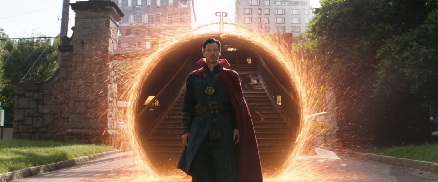 Doctor Strange appearing from portal in Central Park.