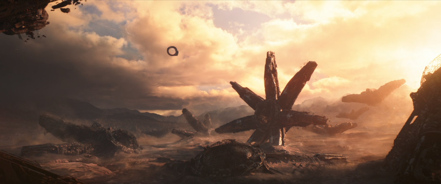 Strange multi-armed structures on the surface of dirty brown planet.