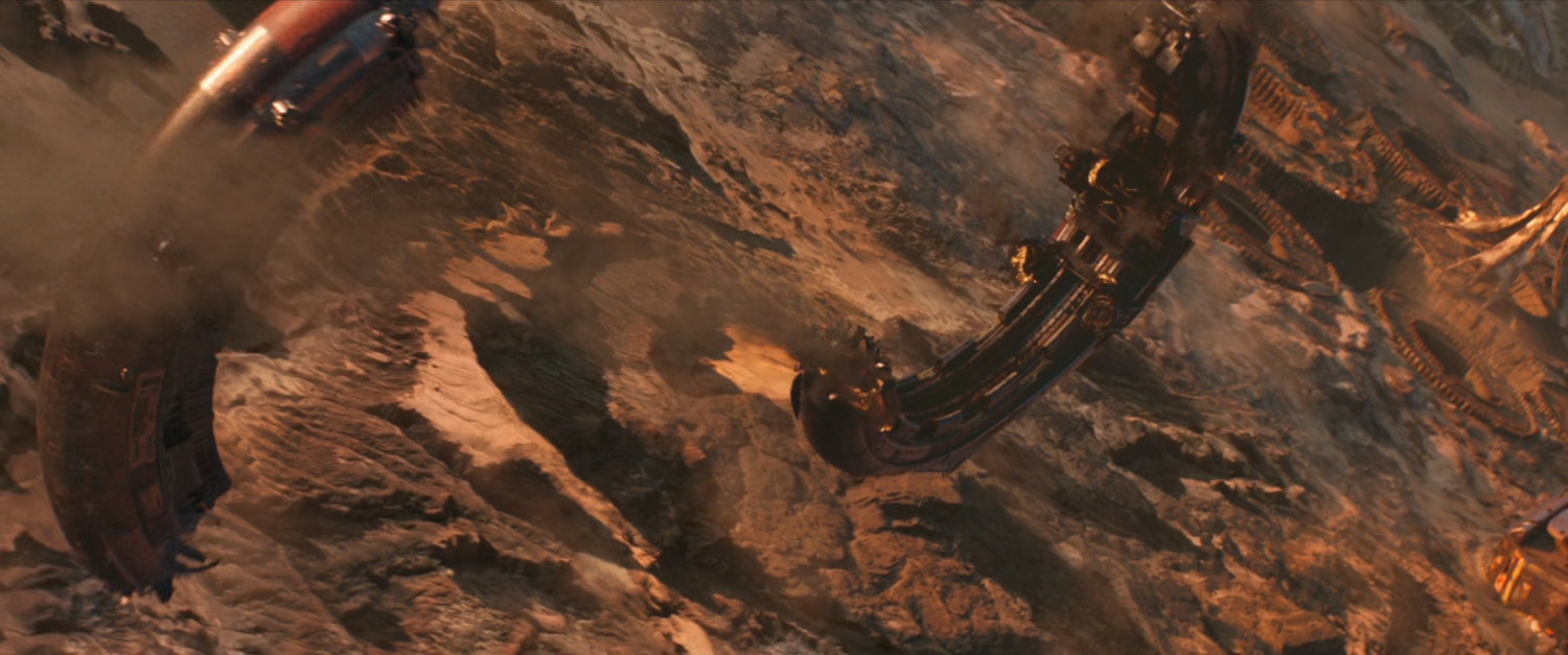 A broken Q-ship crashing  through the atmosphere towards an alien planet.