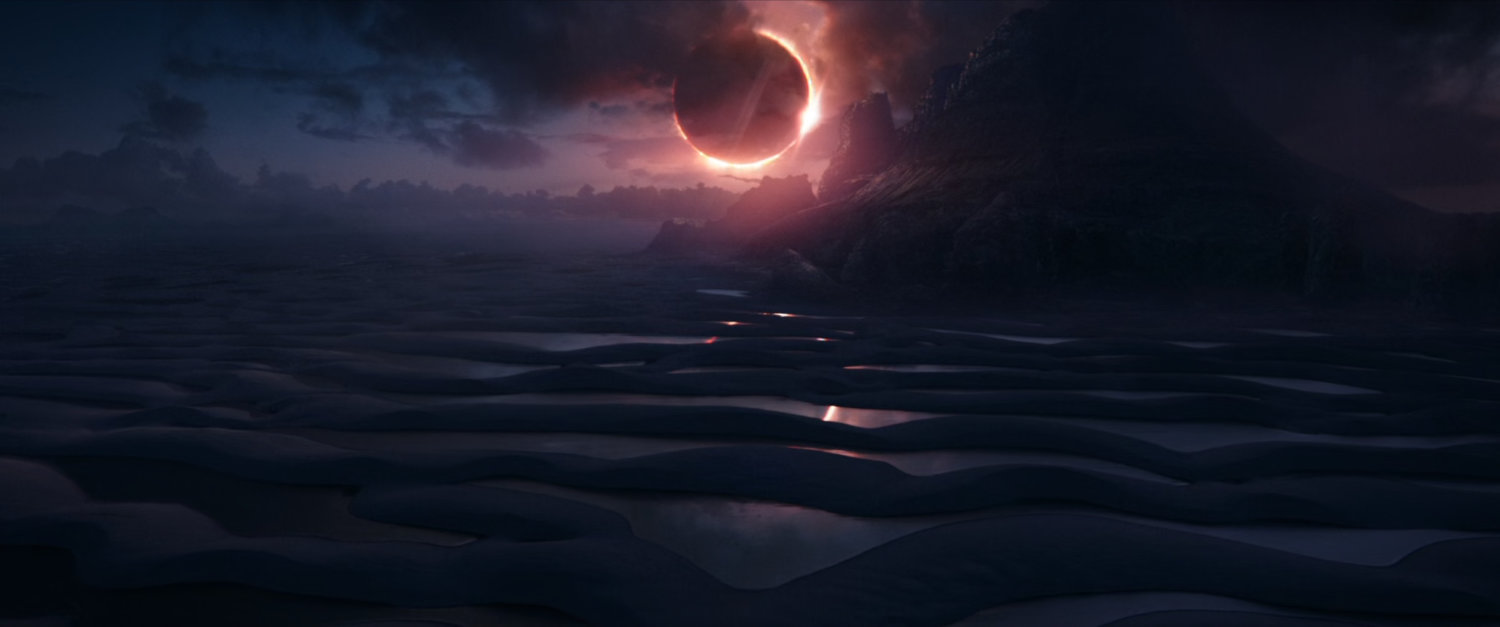 An eclipse of an alien sun over a sandy planet.