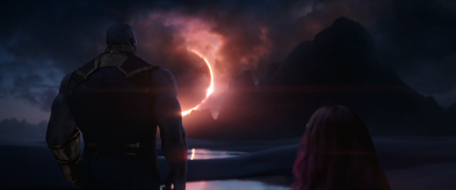 An eclipse of an alien sun over a sandy planet.