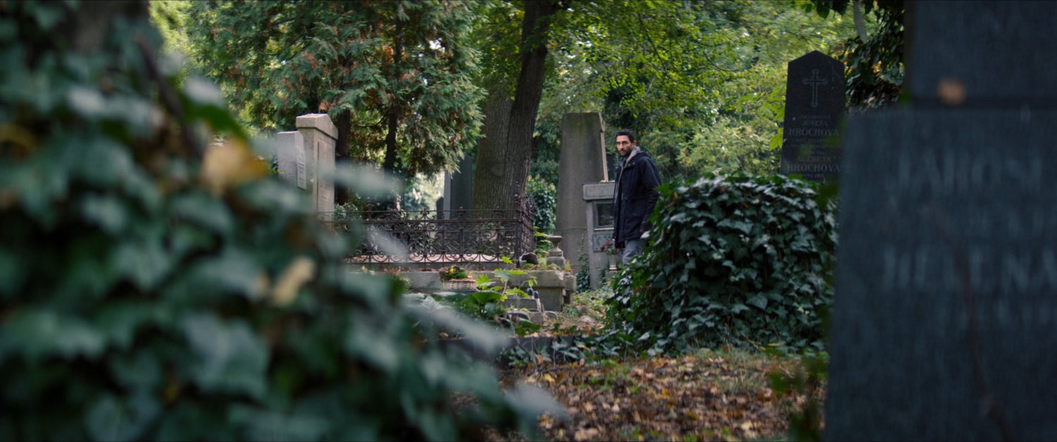 Nico in a Latvian cemetery.
