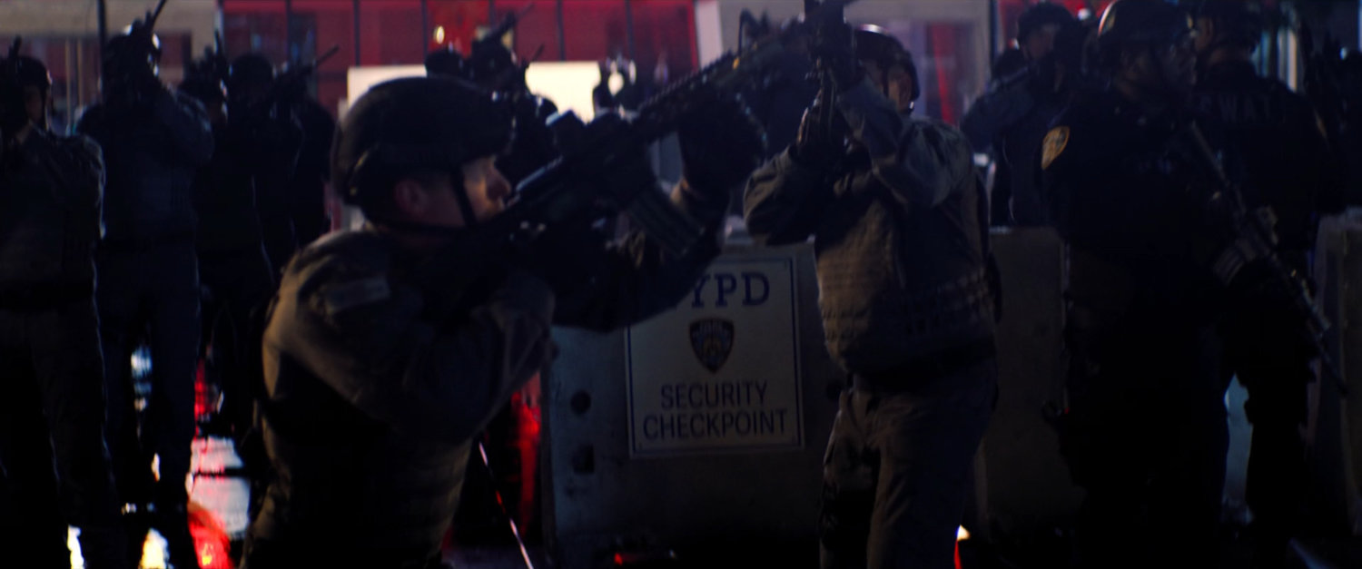 Police officers at plaza in front of GRC Headquarters.