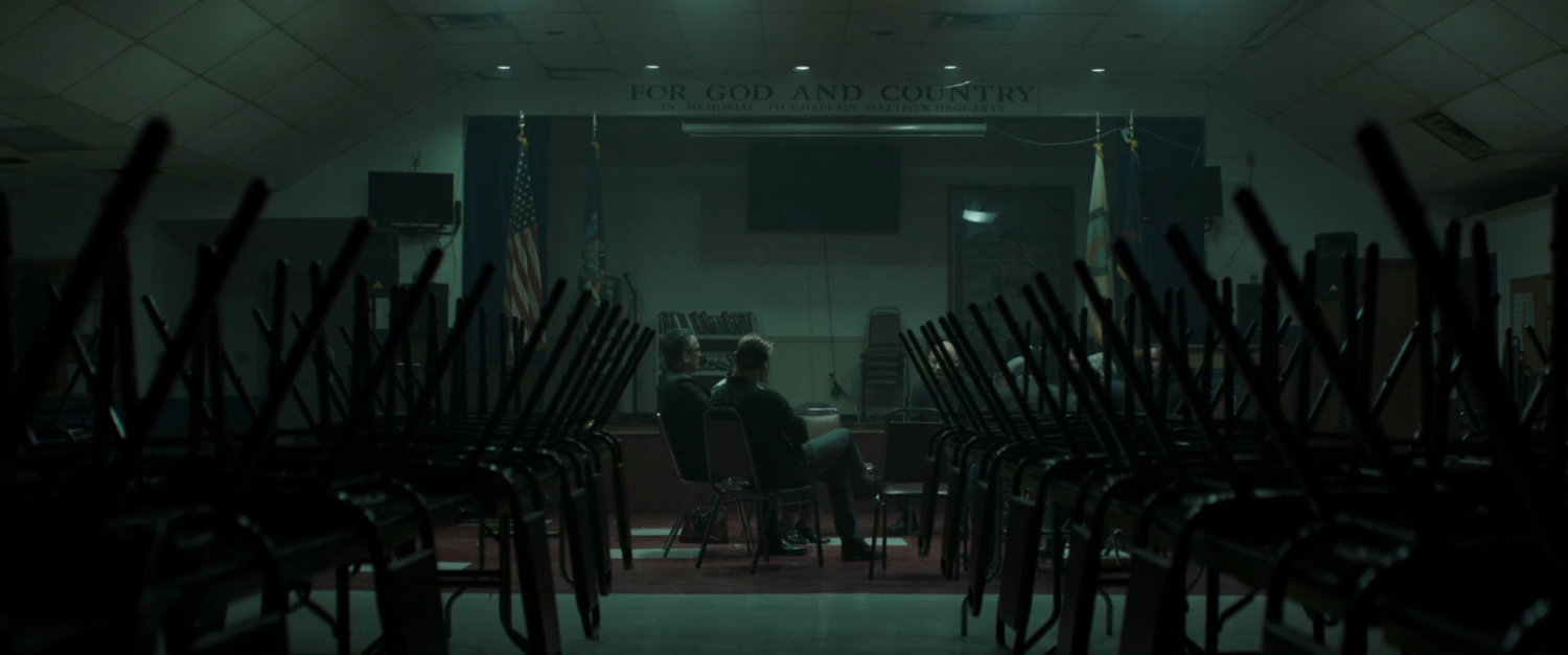 A small crowd gathers at a support group meeting.