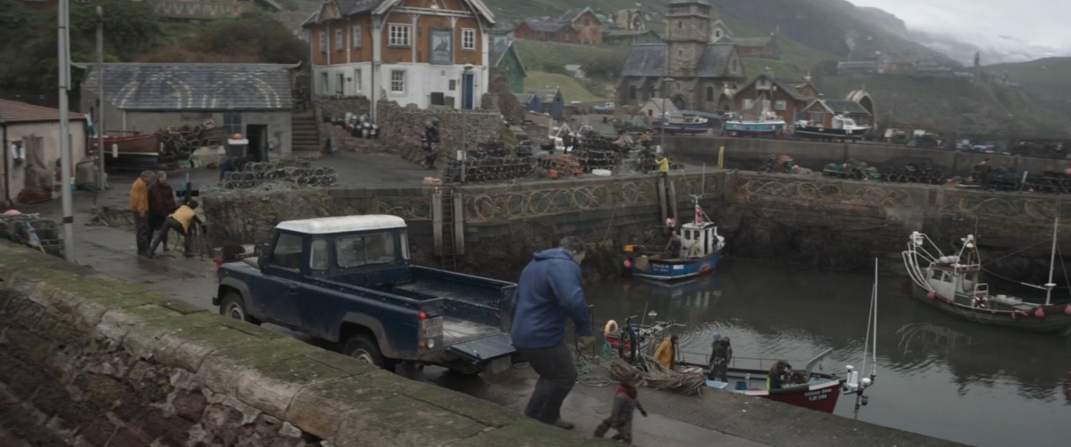 Smart Hulk and Rocket at seaside fishing village.