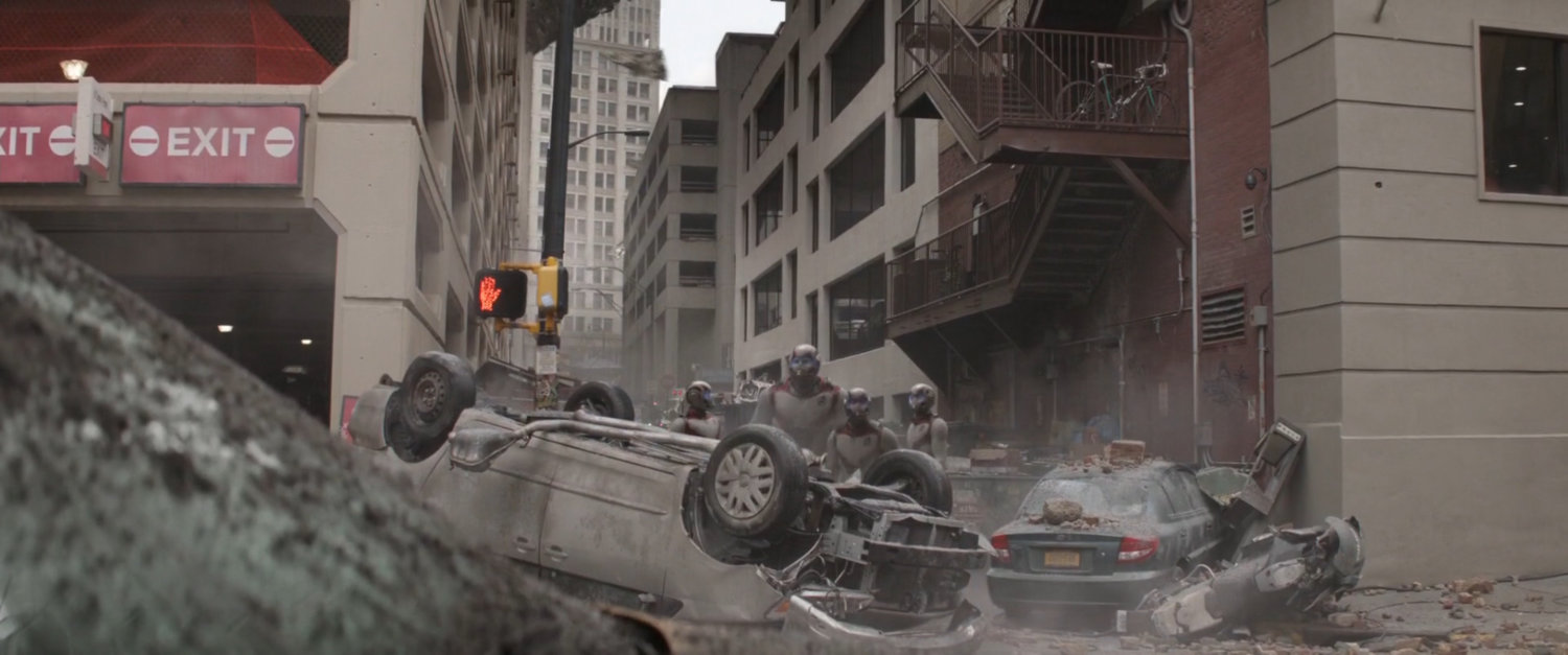 A rubble strewn street and alley in New York.