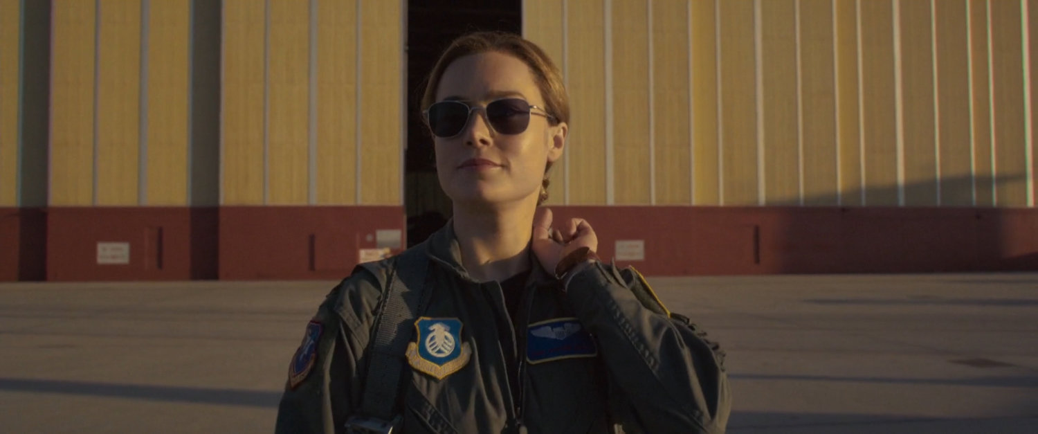 Carol Danvers outside an Edwards Air Force Base hangar.