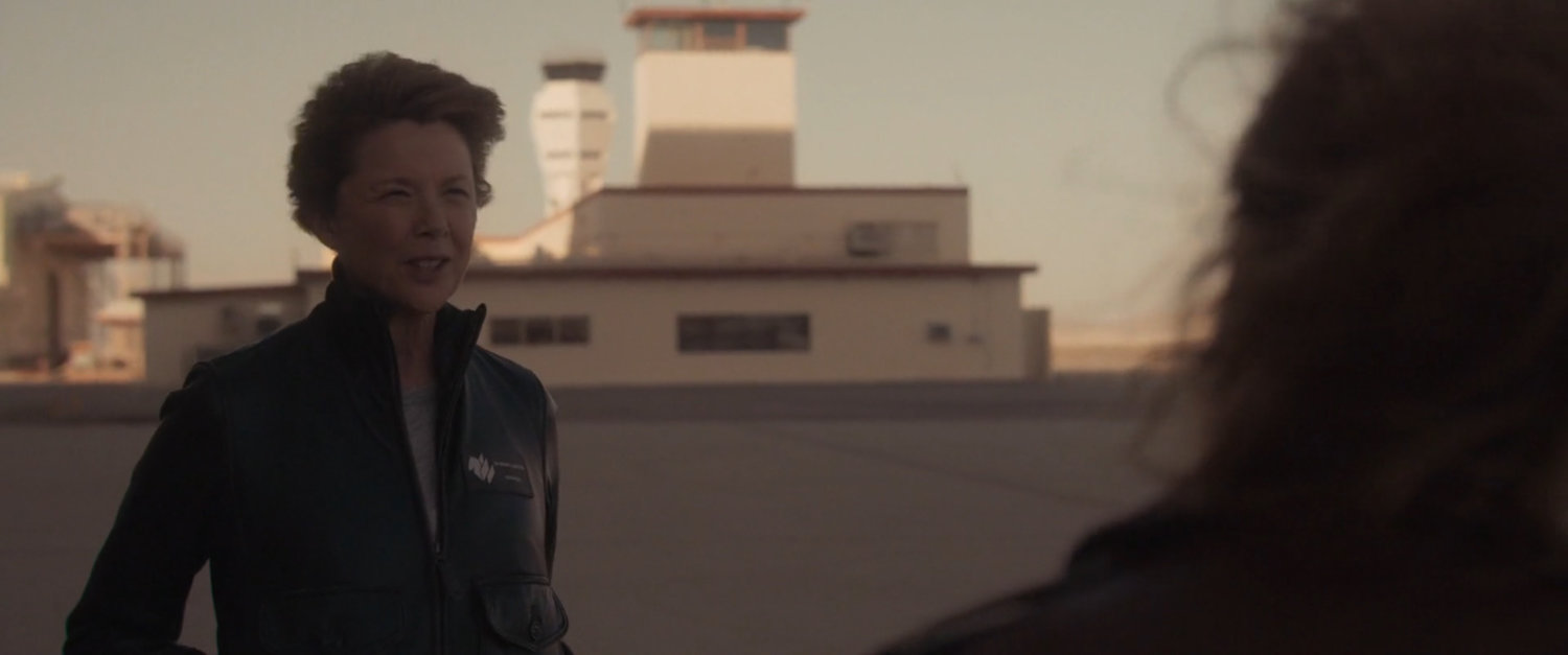 Wendy Larson outside an Edwards Air Force Base hangar.