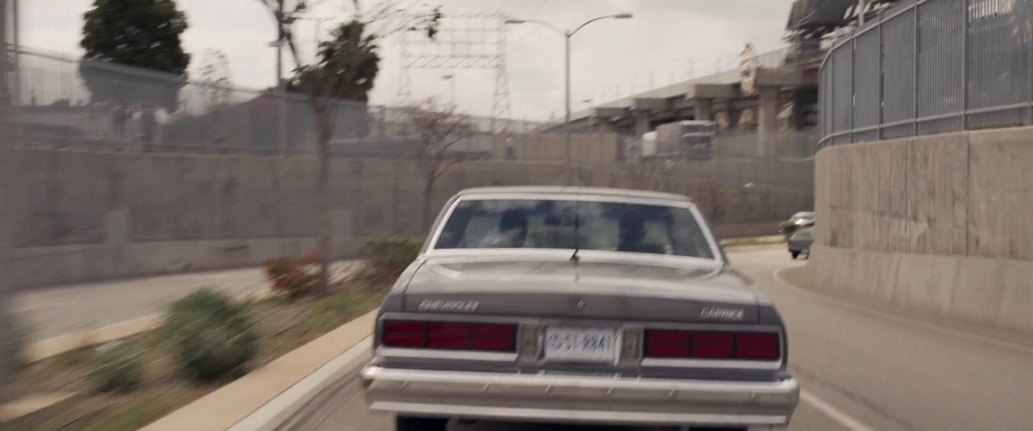 Nick Fury car on street below Los Angeles metro station.