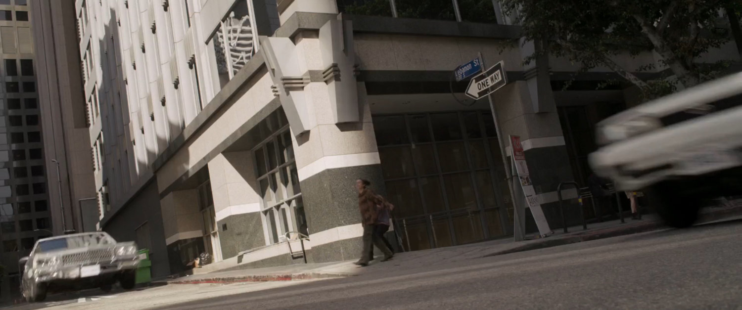 Nick Fury's car races towards Los Angeles intersection.