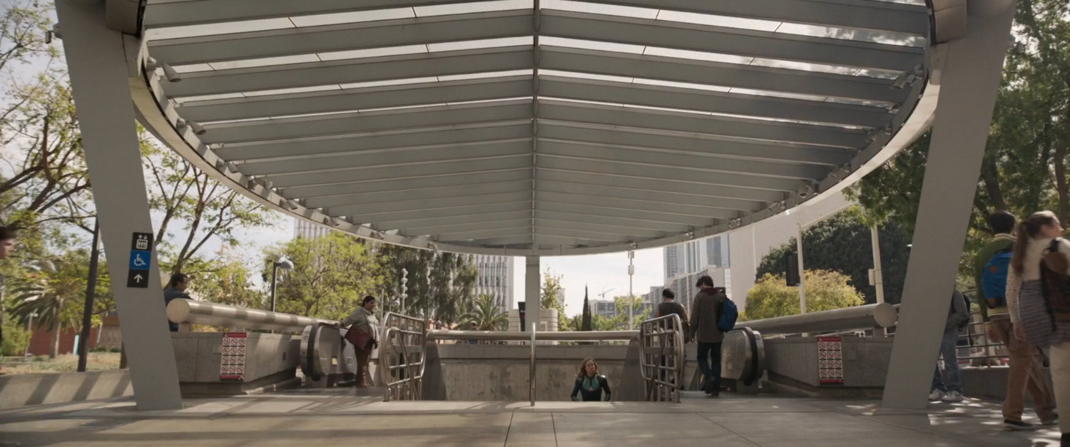Vers ascends stairs out of Los Angeles Metro station.