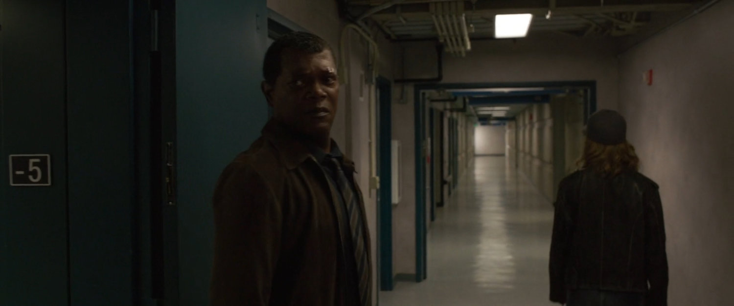 Nick Fury and Vers in the underground records area of Project Pegasus.