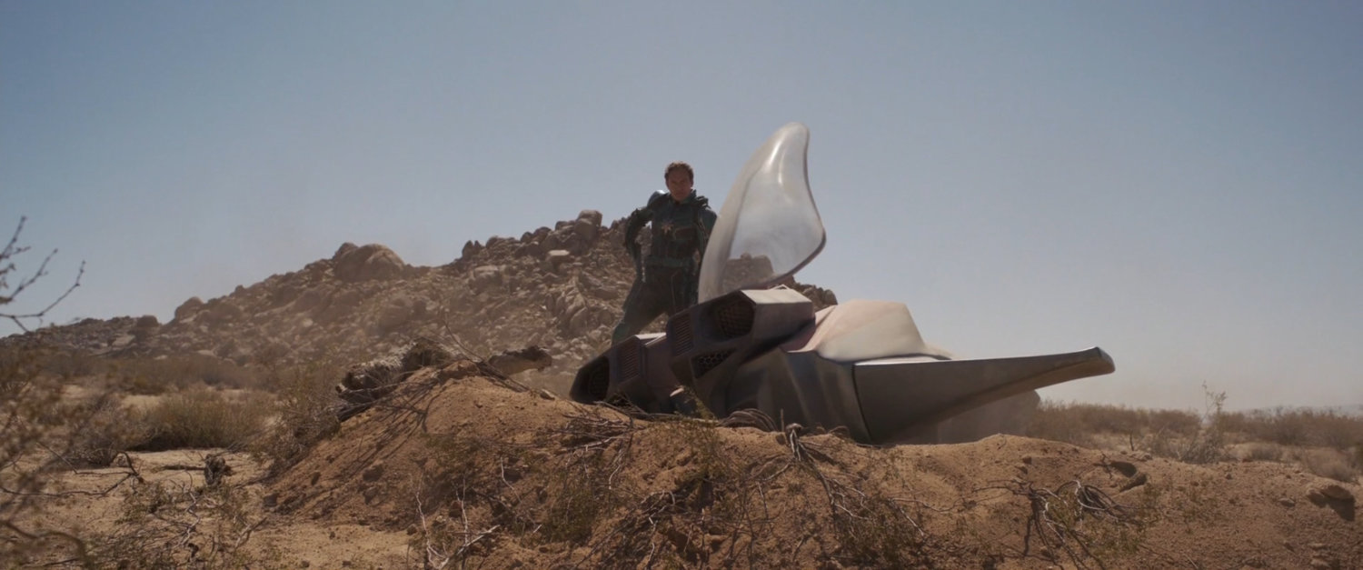 Yon-Togg emerging from crashed ship in the desert.