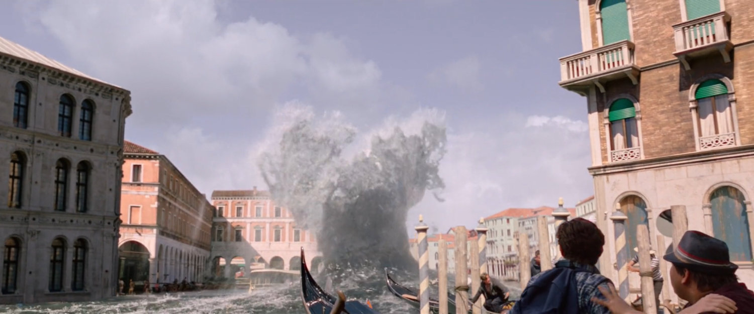 A wave rises up from a Venice canal.