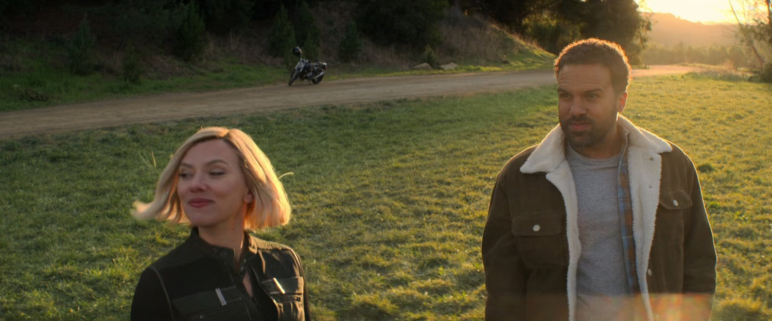 Natasha and Mason in  field at magic hour.