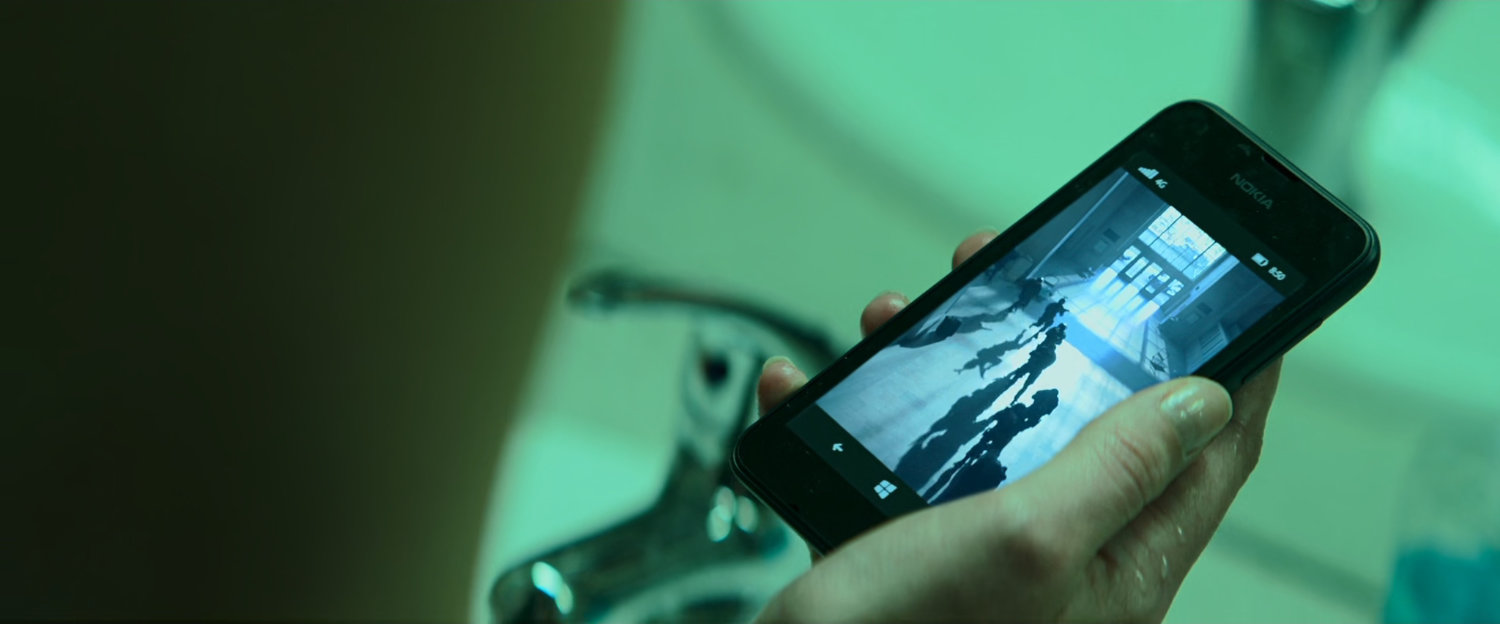 Video image of SWAT team entering terminal on an iPhone being held in hand.