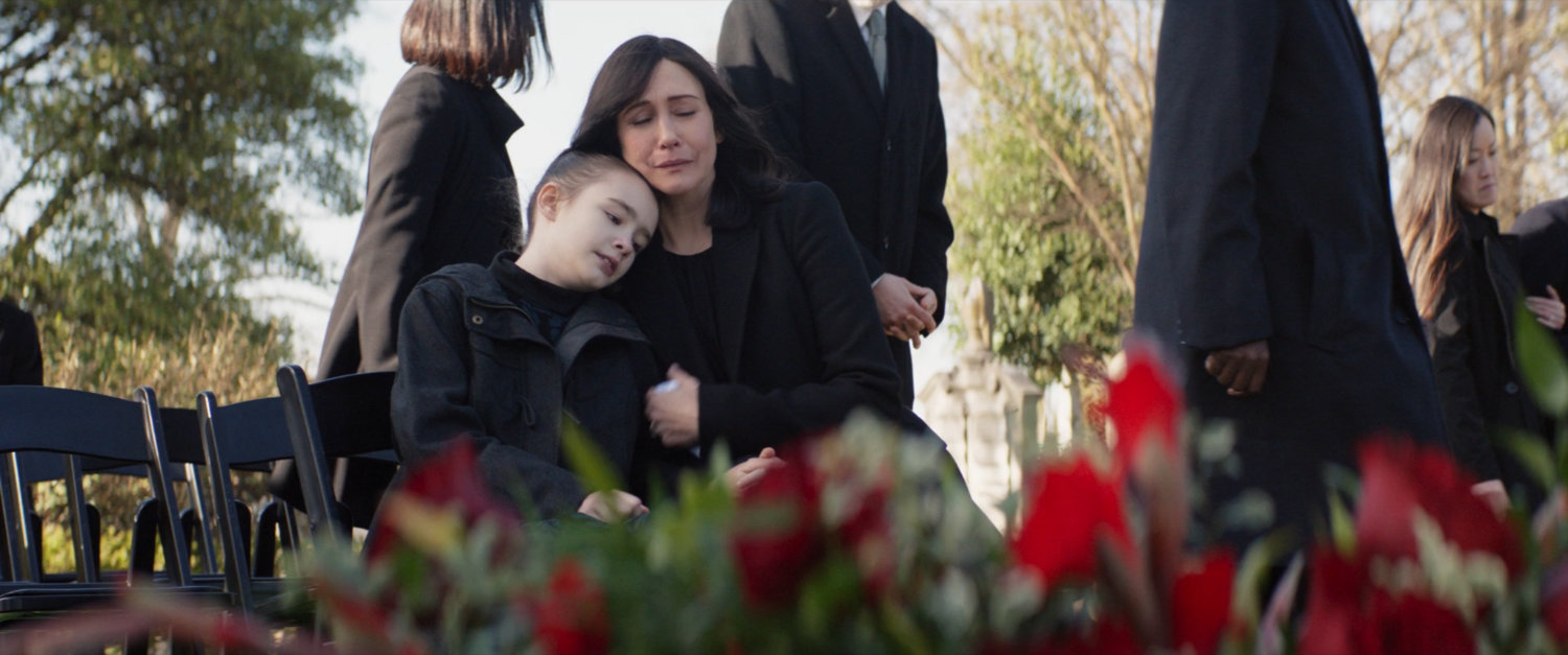 Kate and Eleanor Bishop at the funeral for father and husband Derick.