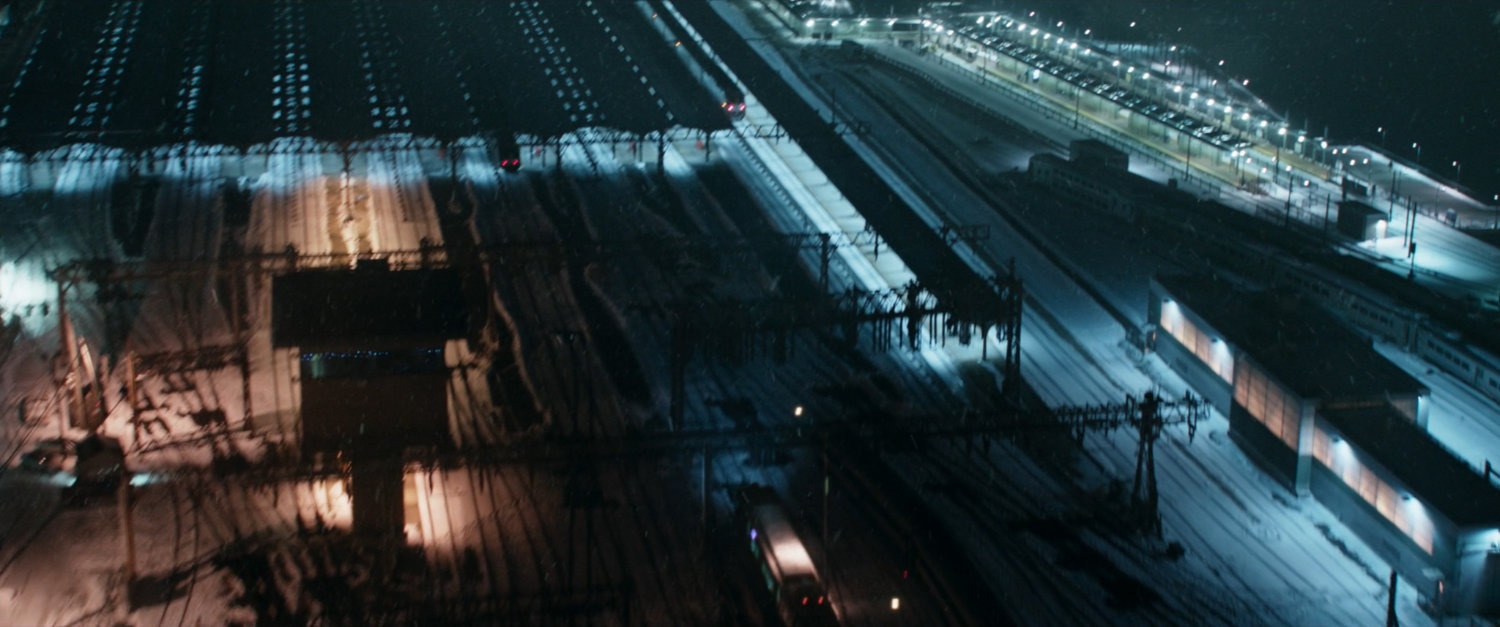 Aerial view of snowy New York train station.