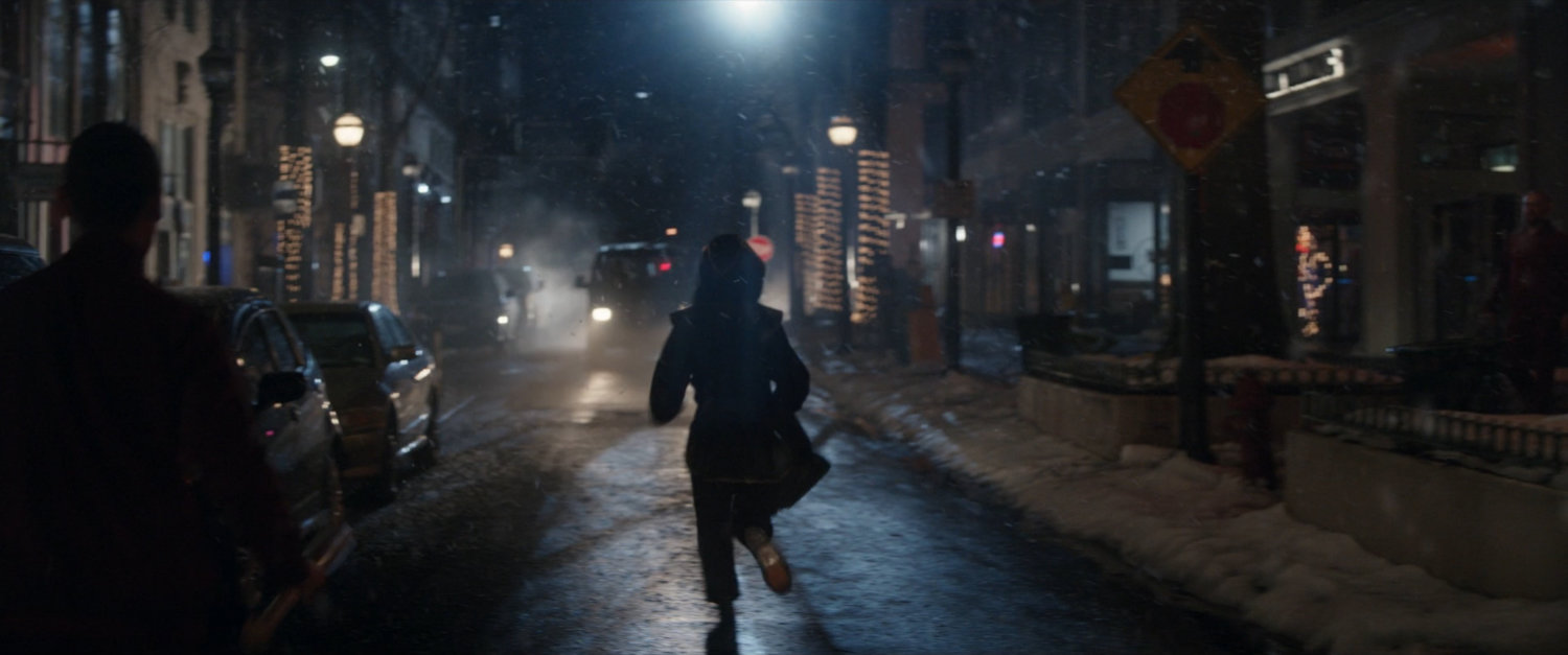 Kate runs down New York street.