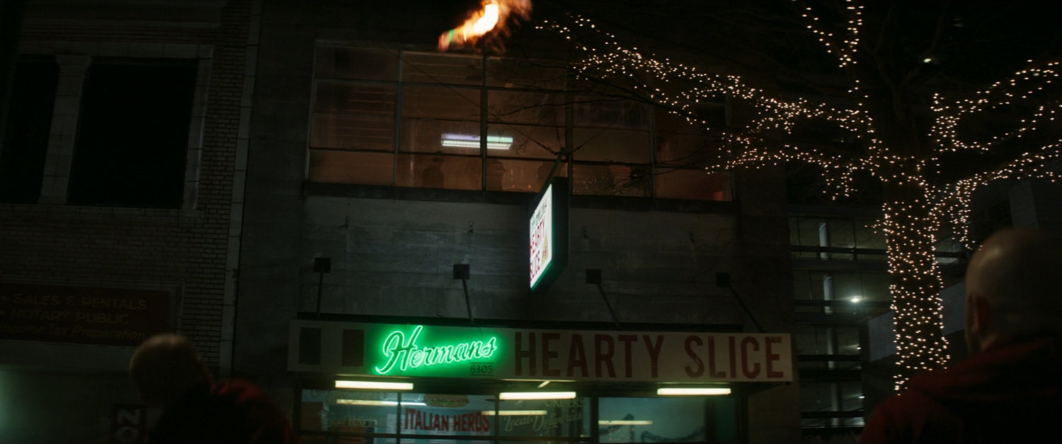 Molotov cocktails being thrown outside Herman's Hearty Slice.