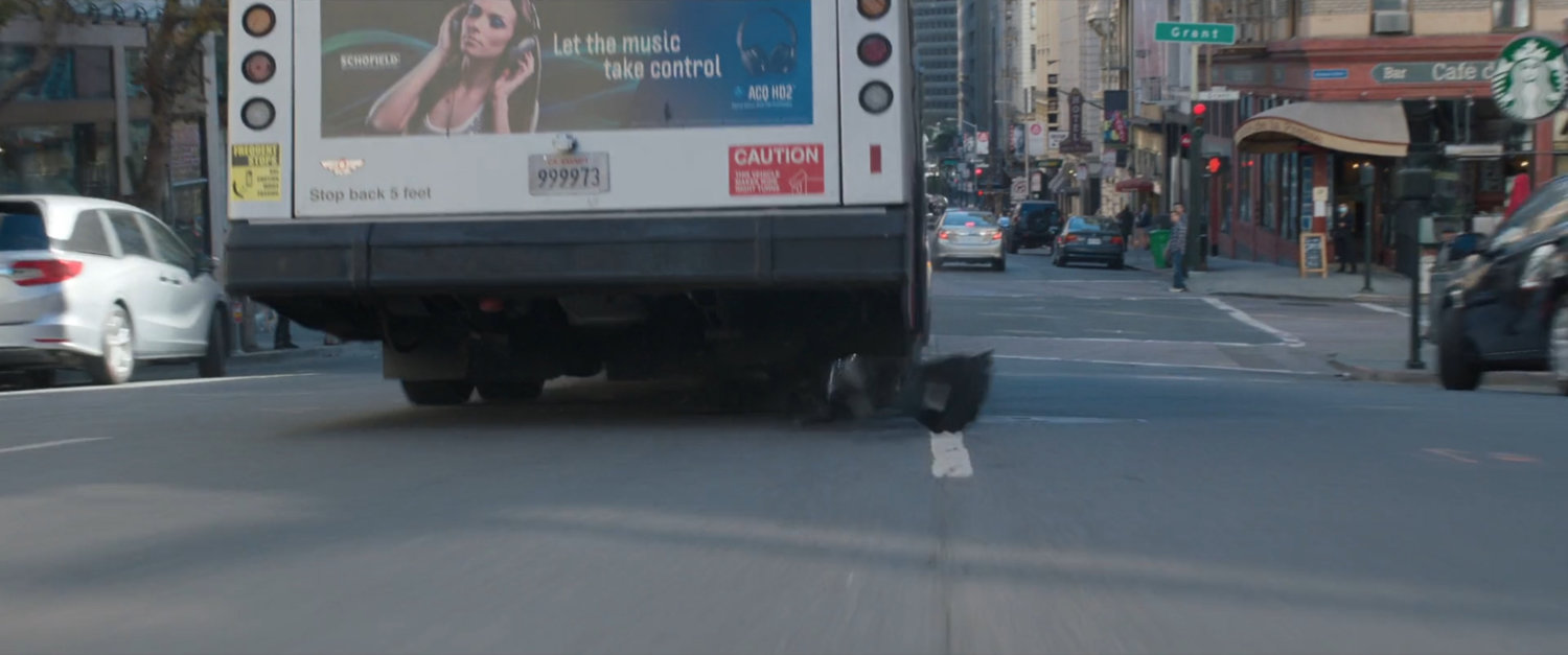 Debris falls off a San Francisco metro bus.