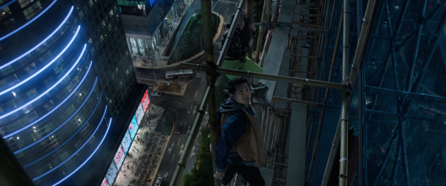 Shaun and Katy on skyscraper scaffolding in Macau.