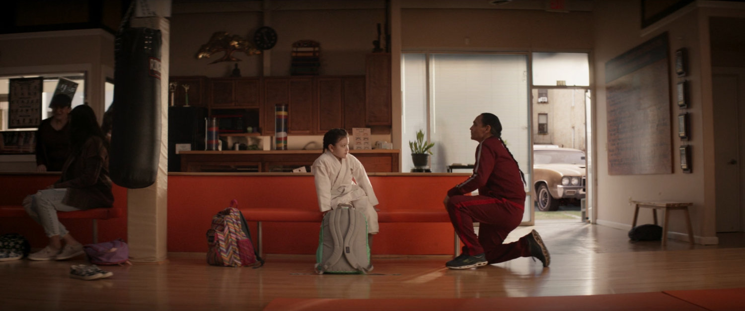 William and young Maya in Brooklyn karate studio.