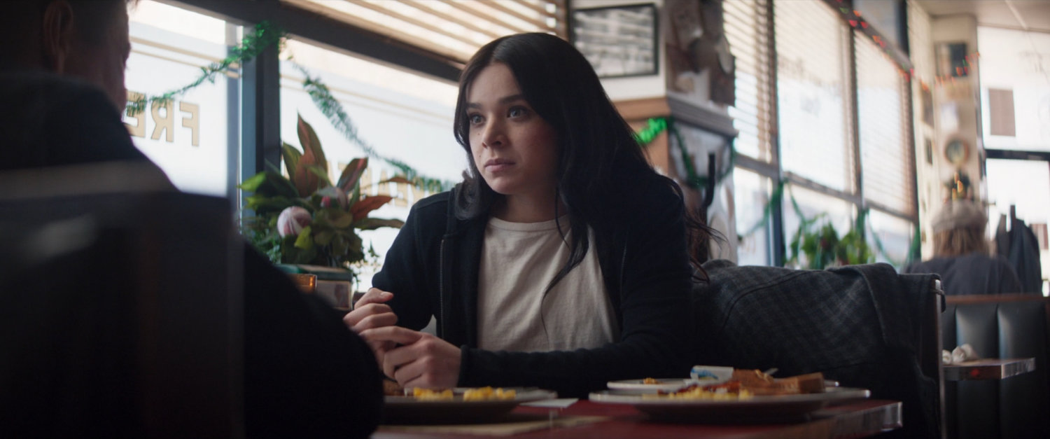 Kate in a diner.