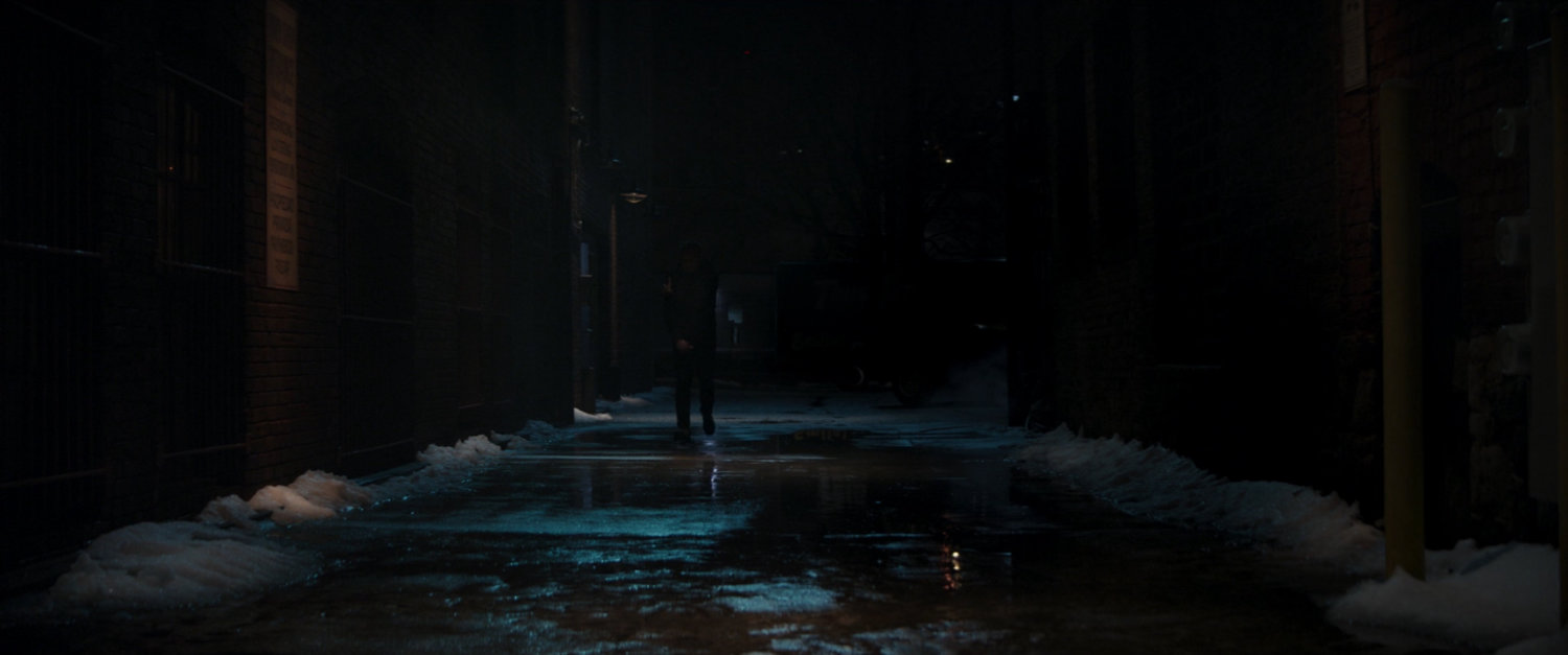 Clint and Kate in a very dark alley.
