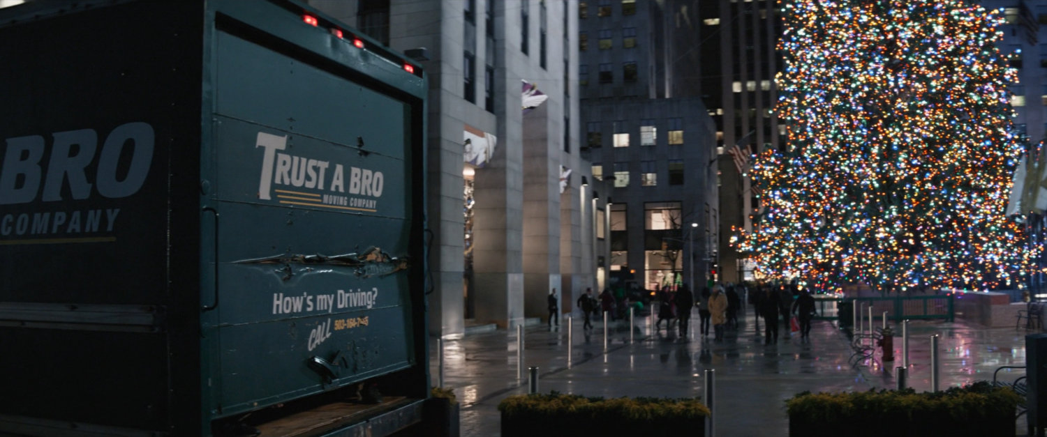 Trust-A-Bro van pulls up outside Rockefeller Center.