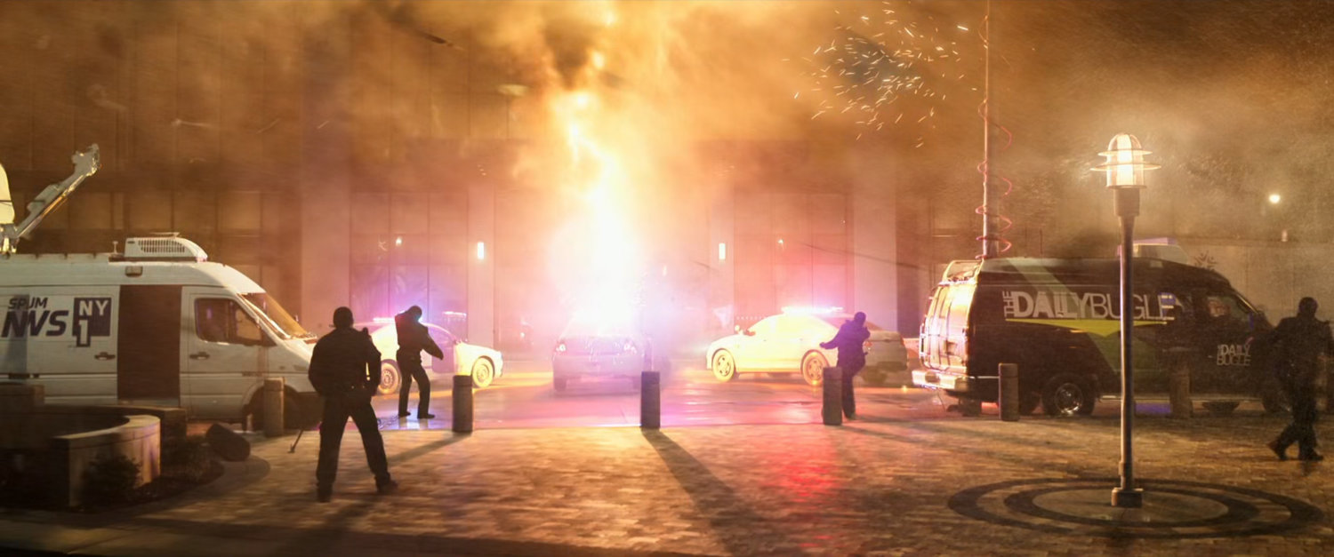 An explosion in front of a Long Island City apartment building, witnessed by by police and reporters.